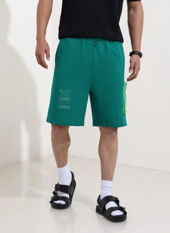 ذا انديان كراج كو Men Oversized Fit Batman Printed Side Pocket Mid-Rise Shorts